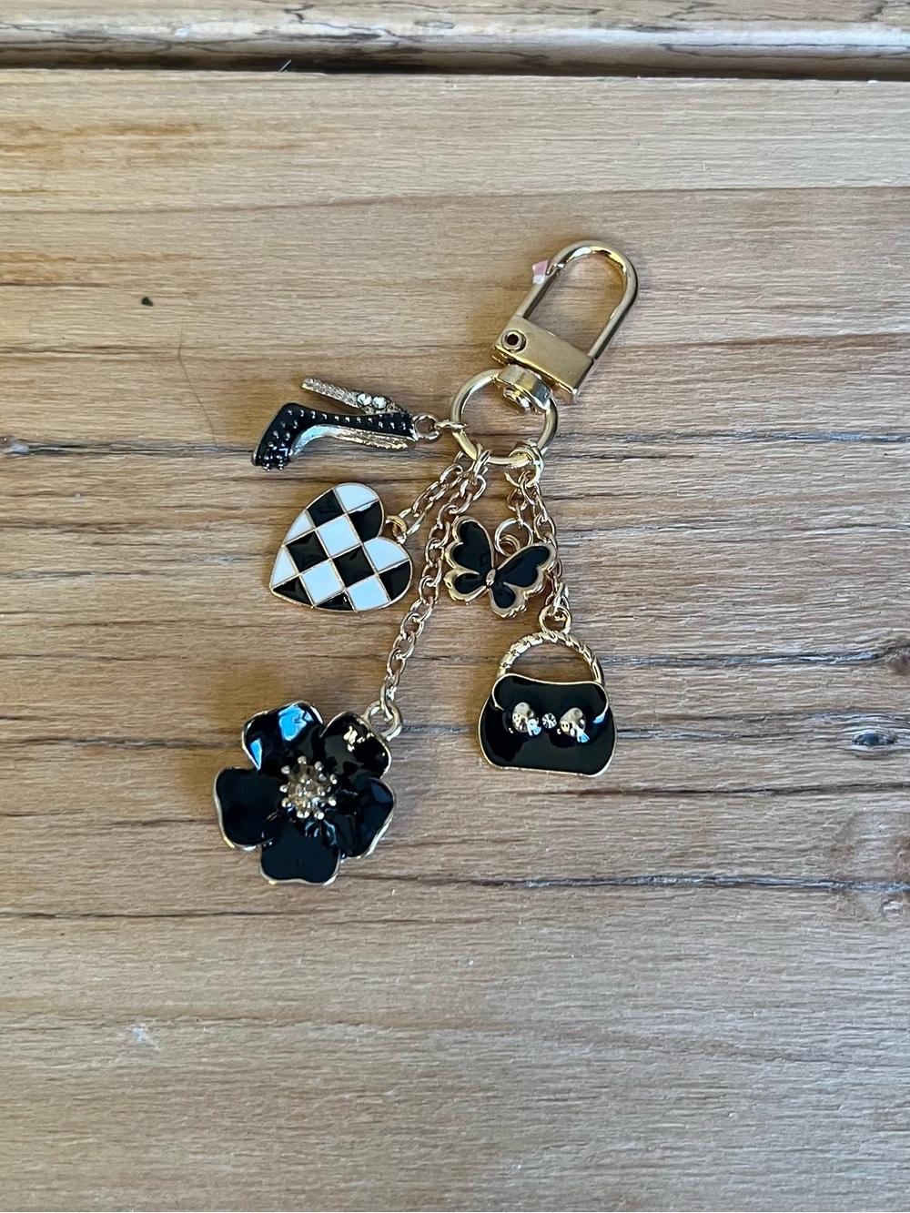 Black floral bag charm